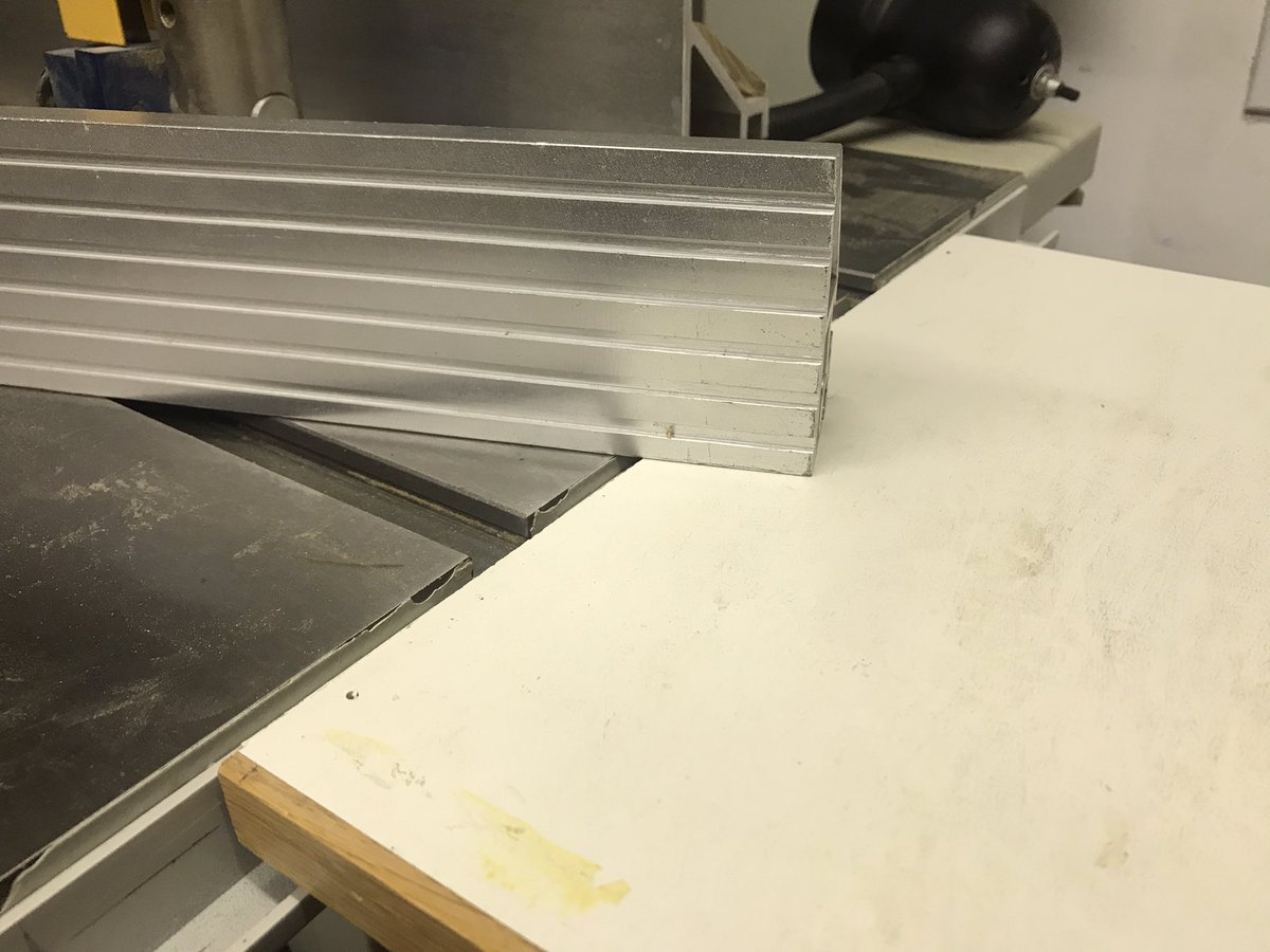 FlairWoodworks's tweet image. I went super-simple for the #extensiontable and just put three screws in the bottom of a piece of plywood. By adjusting the screws, I was able to level the table. The screws also keep the table from sliding away from the bandsaw.