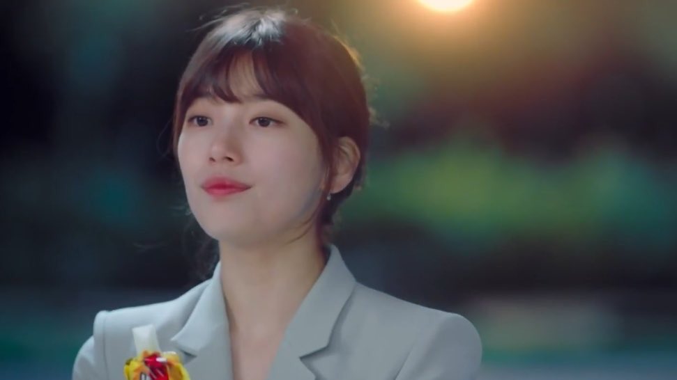 doing what he does best: watching her from afar.