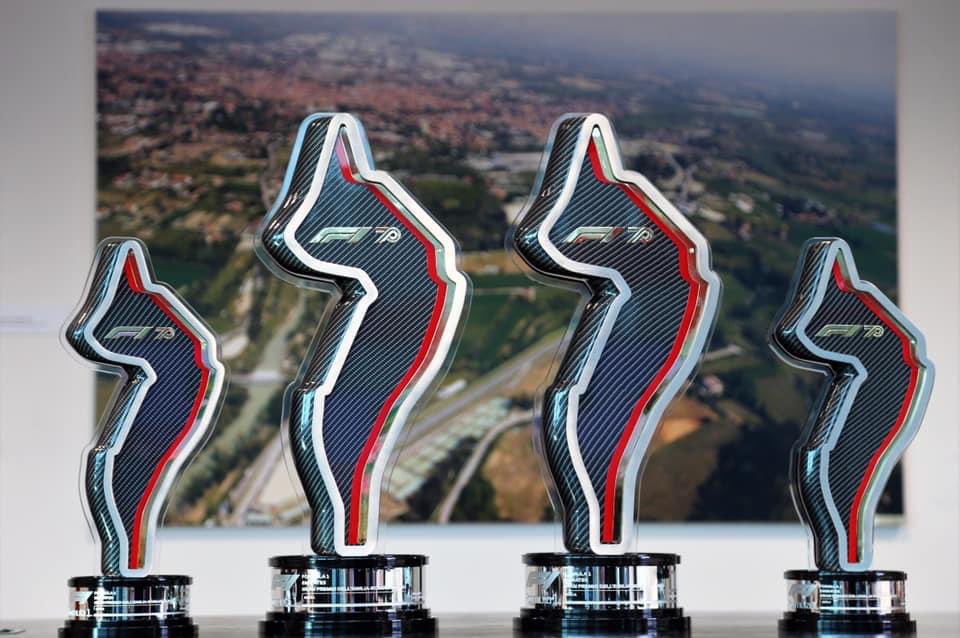 autosport's tweet photo. The trophies for today's race, featuring a .14ct diamond at the site of Tamburello in honour of Ayrton Senna 🇧🇷

#F1 #ImolaGP #SennaSempre https://t.co/cqI2dojLKB