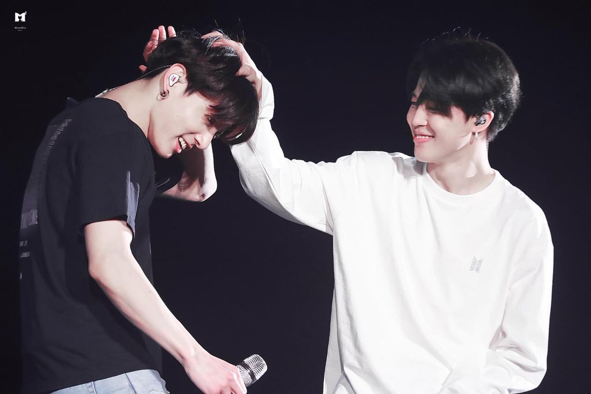 Look at his smile when he pats jungkook's head who ran all the way across the stage to him 