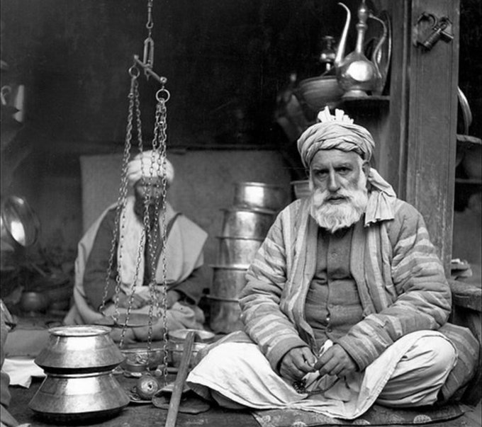 People of Kabul: Shopkeepers. Picture taken in 1946 by Maynard Owen Williams.