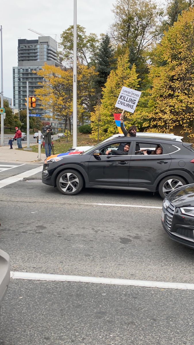 torontodotcom's tweet photo. HAPPENING NOW: Young Armenians are rolling along Toronto streets to protest war over Nagorno-Karabakh, and calling on Canada to recognize it as the Republic of ArtSakh. https://t.co/bgZQ0ZRPTX #Armenia #Azerbaijan #CDNpoli https://t.co/hJJ5oWZFIQ