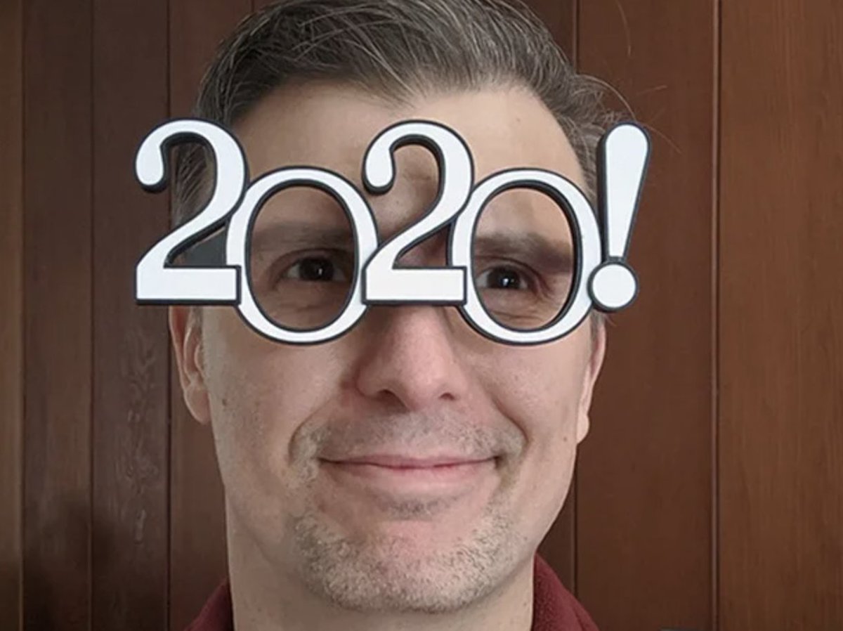 Man wearing 2020 novelty glasses