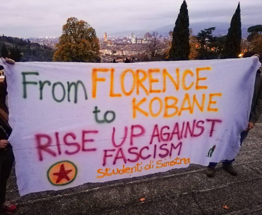 Banner in  #Florence, Italy, on  #WorldKobaneDay !'From Florence to  #Kobane!  #RiseUpAgainstFascism !' #1NovemberWorldKobaneDay #RiseUp4Rojava