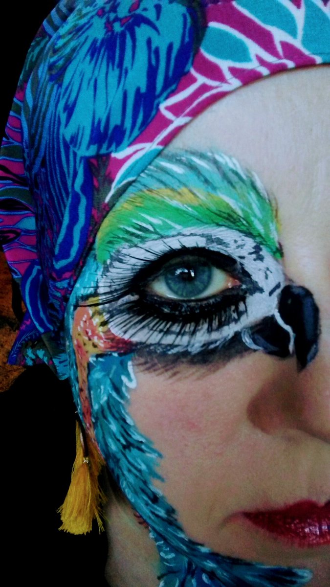 Colorful plumage for todays look. #facepainting #faceart #painting #makeupfun #makeup #colorfullooks #fun #face #makeuplooks #macaws #birds #artist #funmakeup #colorful #bright