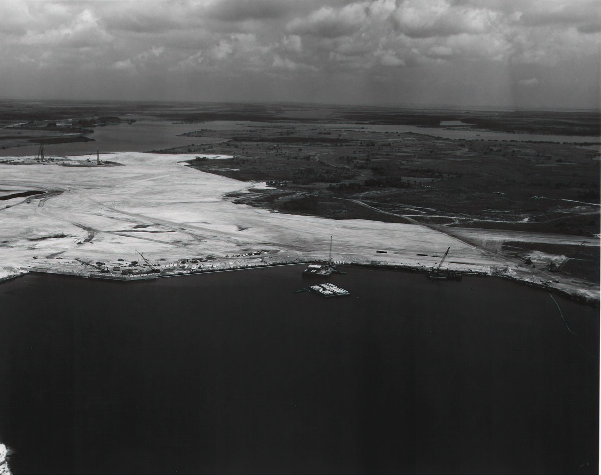 This is the earliest photo of construction that I could find, taken in early 1963. It took around 1.5M cubic yards of soil to to raise the area to around 7 feet above sea level. The fill came from an access channel at the north end of the Banana River.