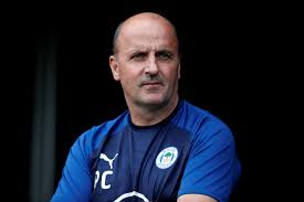 Paul Cook - A motivator who has experience of an impossible situation with Wigan. Would Windass would be exiled from  #SWFC? Overall win percentage of 43.4%, goals for/against is 878:644 & PPG is 1.56. Preference is to play 4-2-3-1 & attacking football on a budget. 12 honours won.
