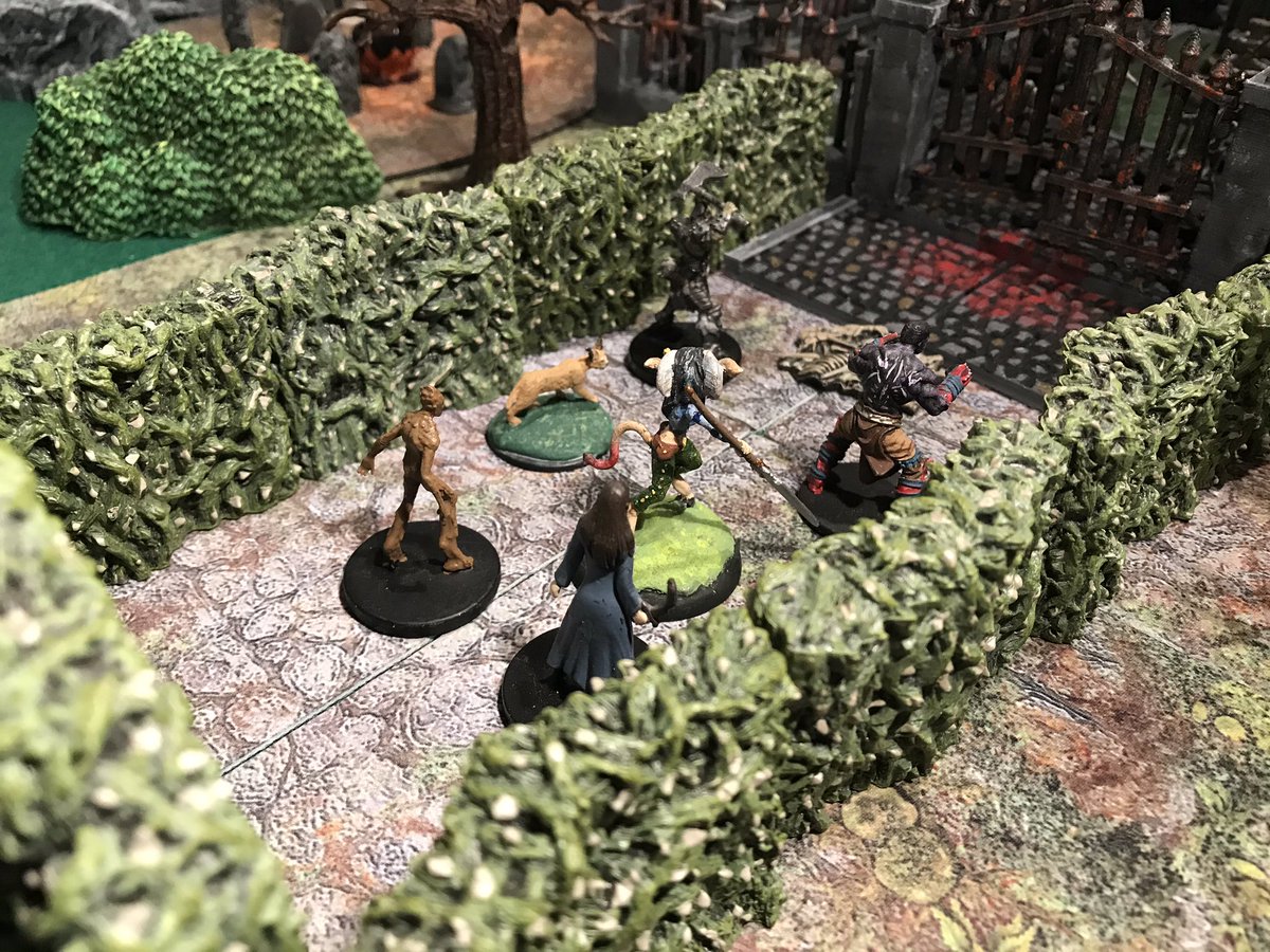 david_b_moffit's tweet photo. Graveyard of the Damned: Hedge entrance section- #dwarvenforge did the hedges and the terrain trays under them. Trees, bushes, stumps, rocks by #monsterfightclub Ruined tower was an eBay purchase & painted with Pokorny paints. Minis by #wizkids #wotc #bombshellminiatures #cmon https://t.co/g8crPnETXq
