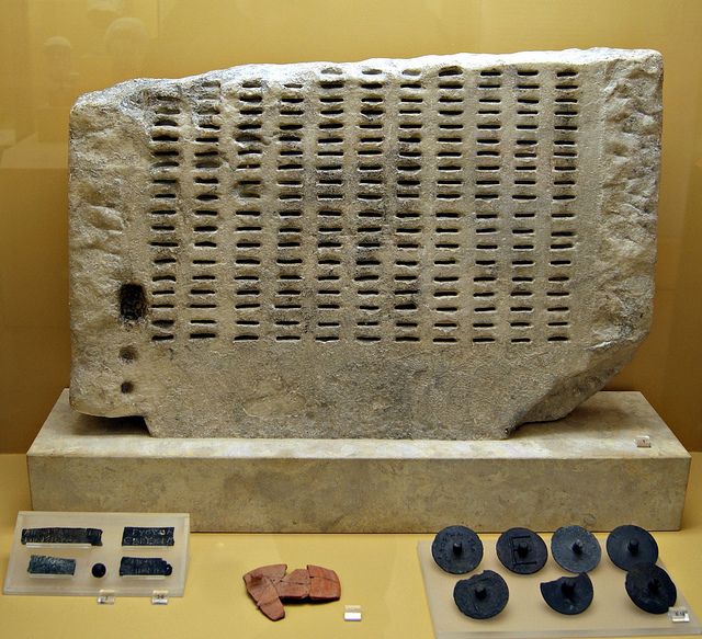 5th cent Athenians used a system called 'sortition' (election by lot) to randomly select those who would serve in their democracy. Citizens would place a bronze ticket with their name into a slot of the ‘Kleroterion,’ or stone voting box. Here's one from the Agora Excavations.