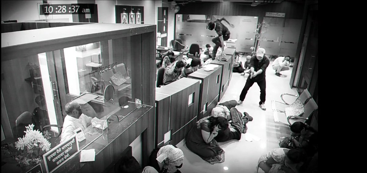 The flowers are kept on cashier's table in not much well maintained condition and the frame is black and white depicting some confusion, amazement and past incidents @Nawazuddin_S  @pathakvinay