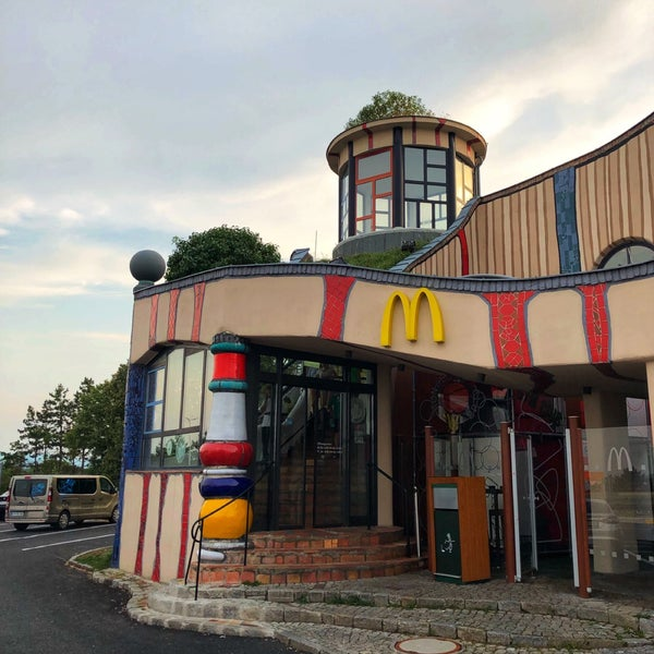 nonstandardmcd's tweet image. this location was designed by notable austrian architect fiedensreich hundertwasser, featuring his signature bold colors and organic forms. he would go on to do a second project for mcdonald's in the form of the ronald mcdonald house in essen, germany (last photo).