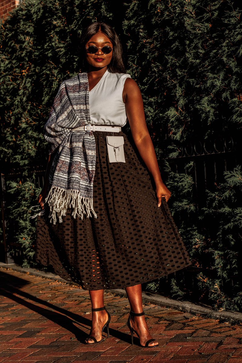 AbsKyei's tweet photo. Styled my #Mama’s poncho as a scarf with a simple tee ad my @marahoffman eyelet skirt! https://t.co/7lgtkpdXvf