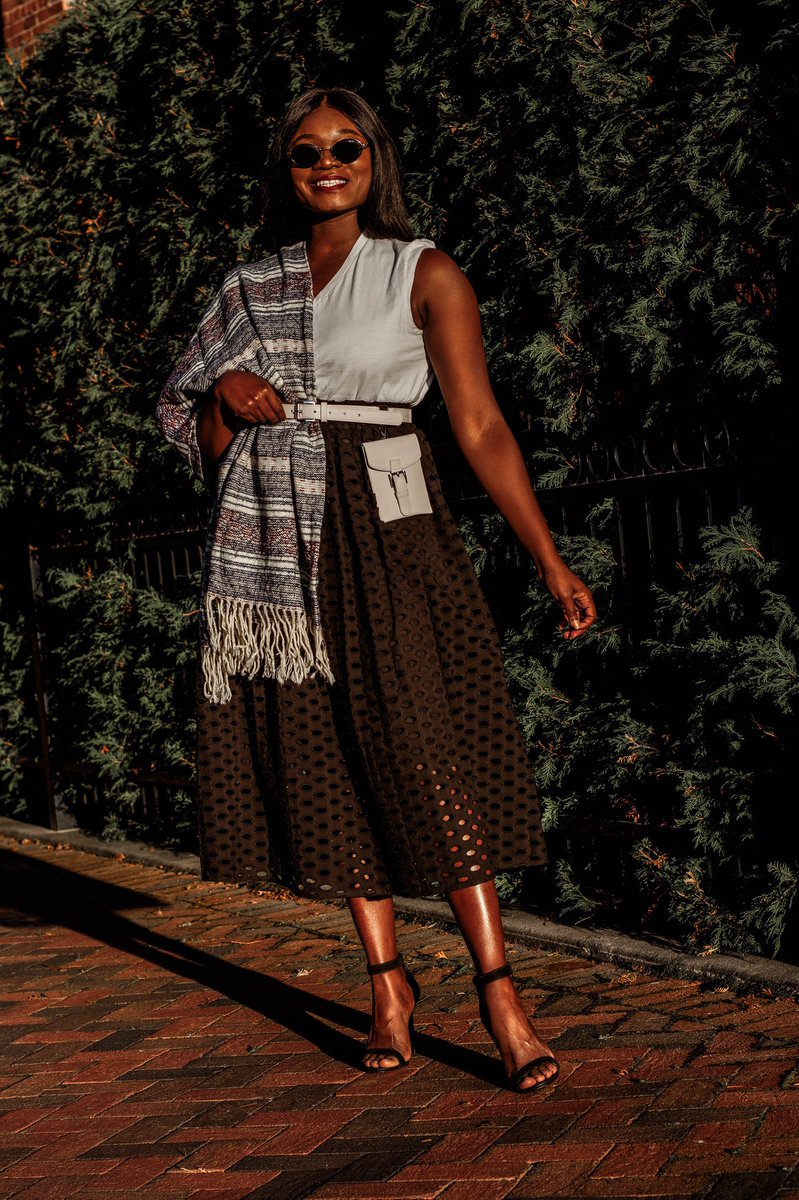 AbsKyei's tweet photo. Styled my #Mama’s poncho as a scarf with a simple tee ad my @marahoffman eyelet skirt! https://t.co/7lgtkpdXvf