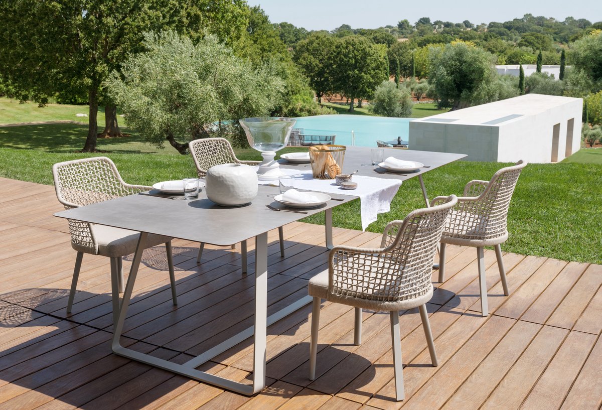 The elegant Emma dining chair designed by Monica Armani from Varaschin. With iconic hand woven backrest, aluminium or Iroko wood frame. Brilliant design allowing drainage of water, waterproof and has UV light resistant structure #elegant #home #outdoorliving #rfun #interiordesign
