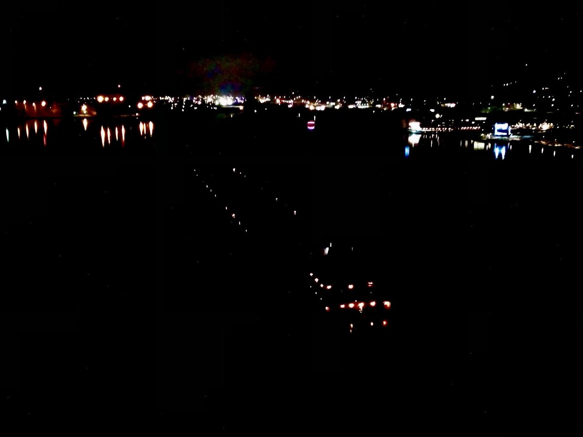 KateVanDaele's tweet photo. There is something about the lights in the bay that bring a sense of calm and hope. Welcome to the @cityofduluth Joyce L. Van Enkevort! Thanks for shining your light with us! @OldLifty @greatlakesshipp #lakesuperior #aerialliftbridge #duluthmn https://t.co/sHBizTuzWi