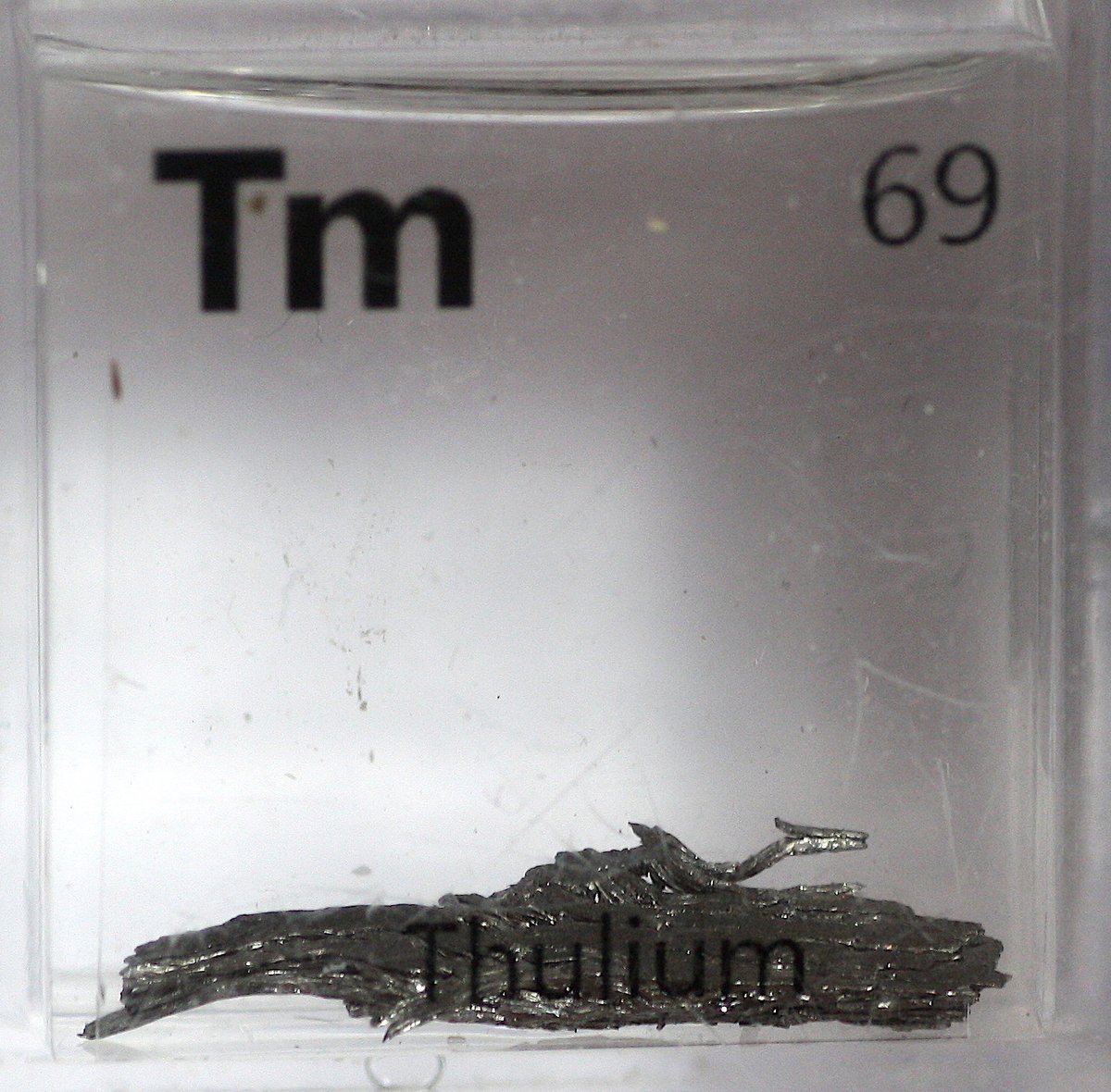 Thulium  #elementphotos. White compound is thulium oxide (Tm2O3).