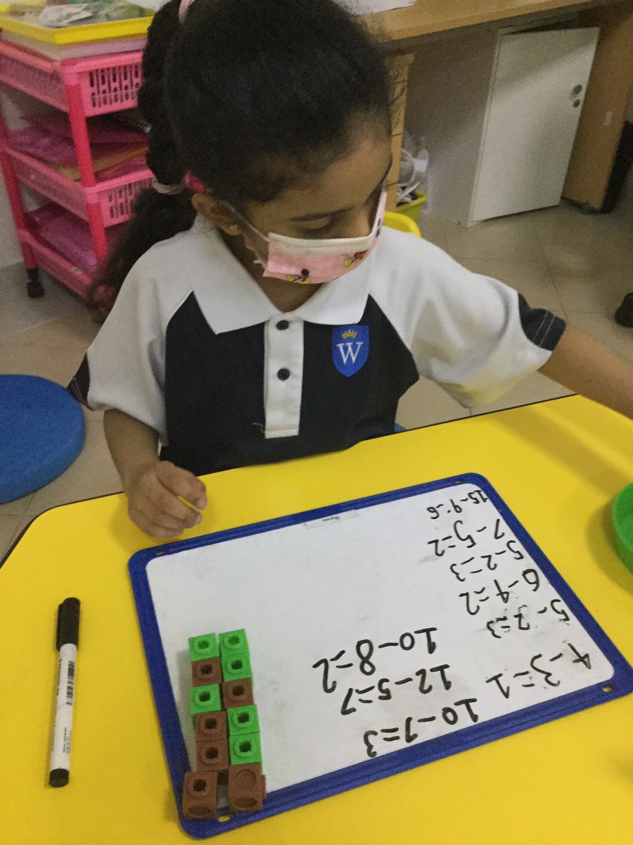 WPS_Year1's tweet image. We love working practically in #WPSMaths Today we made amounts 10s frame style and then took away parts to see how many we had left. We recorded number sentences using the correct symbols. 
Can you think of different words for subtraction?
Tweet us your ideas #WPSRemoteLearning