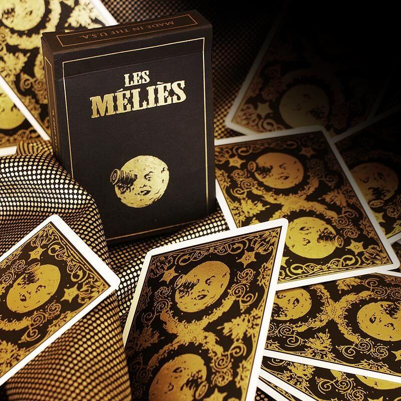 JPGAMESltd's tweet photo. The most luxurious Melies yet.  Stunning gold foil contrasts beautifully with the black and the intense premium black of the case.  A limited edition of 2500 decks printed by the US Playing Card Company on thin crushed stock.

https://t.co/dT53RTVBNo https://t.co/CTQDRiLgzC