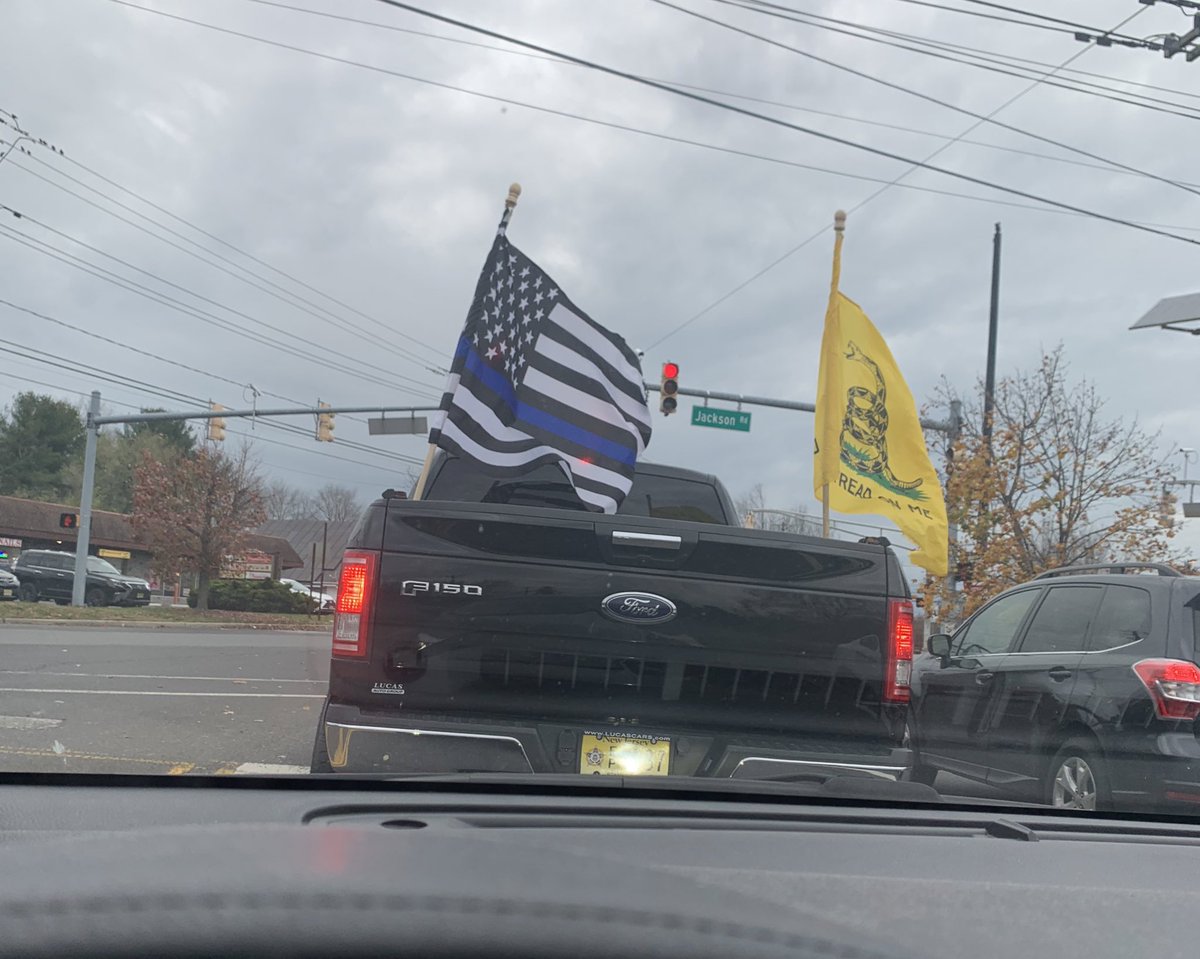I don’t think there will ever be a funnier combo of this kind of “flags on my truck” guy