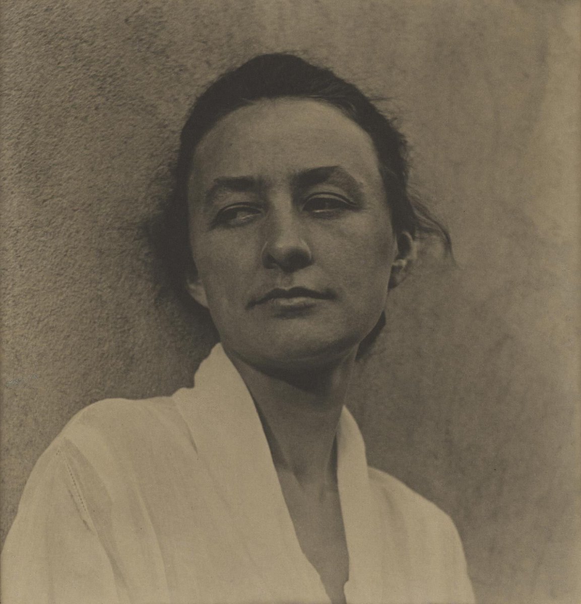 O’Keeffe, not unreasonably, was angered at being termed a woman artist. She was an artist & that was that. Her final work was done mainly in pencil & charcoal (until 1984) Sky Above Clouds (1965), O’Keeffe by Paul Strand (c1917), Untitled, Roof with Snow (1916) & Sunrise (1916)