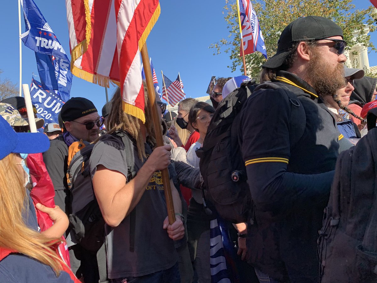 GasPassChic's tweet photo. Save Our Children sign, Proud Boys train politely moving through crowd to the podium, Chinese Americans https://t.co/BU45zUCn9e