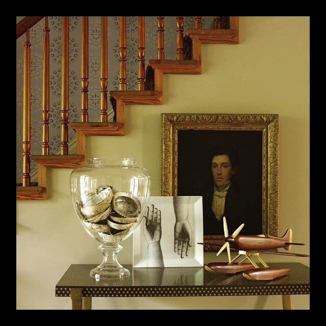 EricCohler's tweet photo. Space beneath a stair is filled with a table that displays a whimsical collection of objects whose forms & provenances play off each other unexpectedly. #cohlerondesign #design #decor #thebook #ericcohler #mixmaster https://t.co/i6bF6WMunu