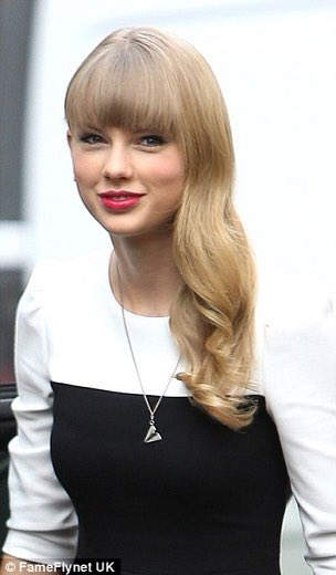 nov 7thtaylor is photographed wearing the paper airplane necklace this comes up again later for many reasons