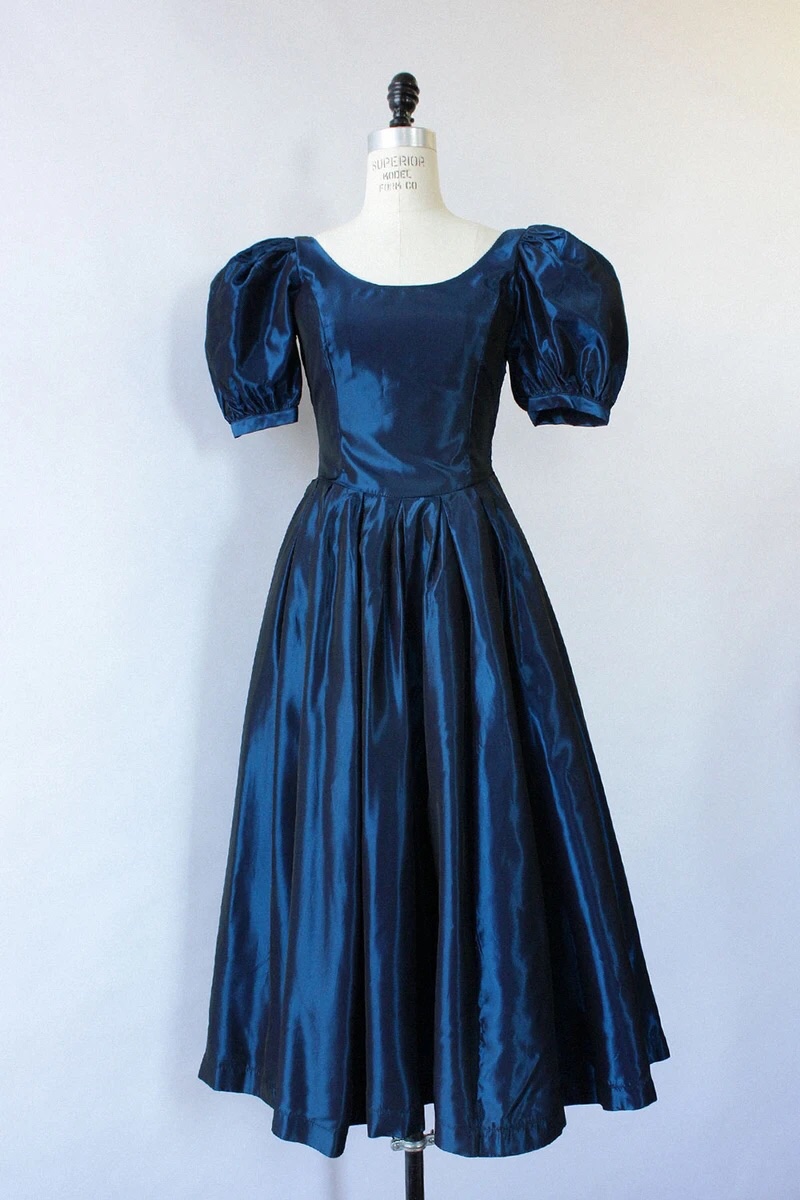 Reminds me precisely of those wonderfully wretched Laura Ashley puff sleeve dresses from the early 80s 