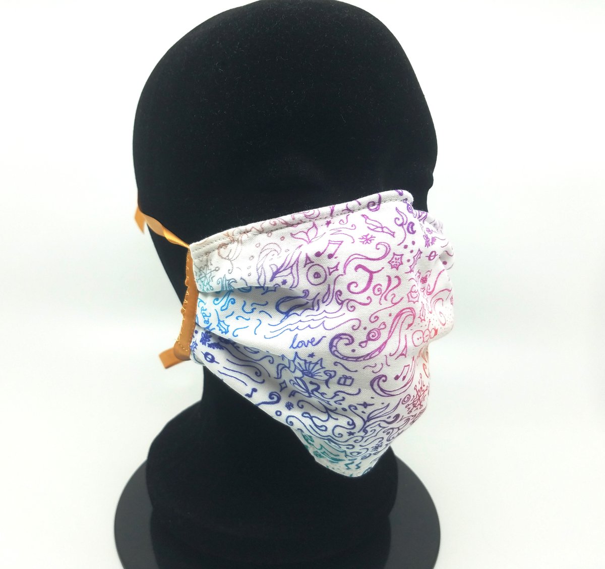 Moonlitfractal's tweet photo. Good news! "Holiday Cacophony" masks are now in stock! 4 layer, super comfy masks in a festive holiday print that I designed myself. Get one today! https://t.co/MV3zp7vXbn https://t.co/jLpLKytQYE
