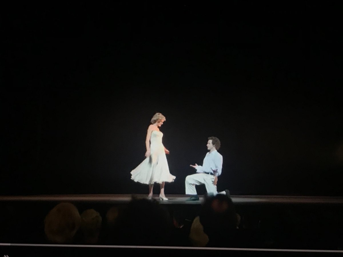 This dress looks like it was based roughly on a Murray Arbeid she wore to a gala a few weeks prior and the pale blue chiffon Catherine Walker. She actually wore this white dress to the factual version of this event