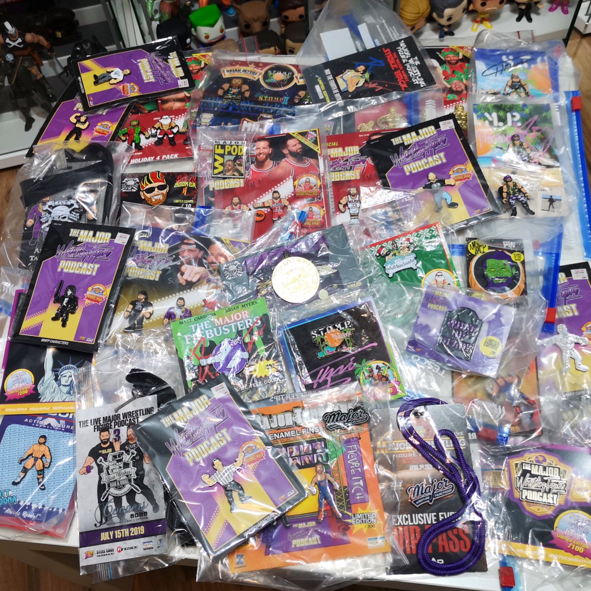 TTDWrestling's tweet photo. Just checking out the @MajorWFPod pin collection! All stored safely! Need to figure out a way to display them but I like them on the card backs too much to take them off! 🤷🏻♂️ #pinpinainteasy #majorwfpod #zombiesailor #ttdwrestling https://t.co/pDsga7XI1v