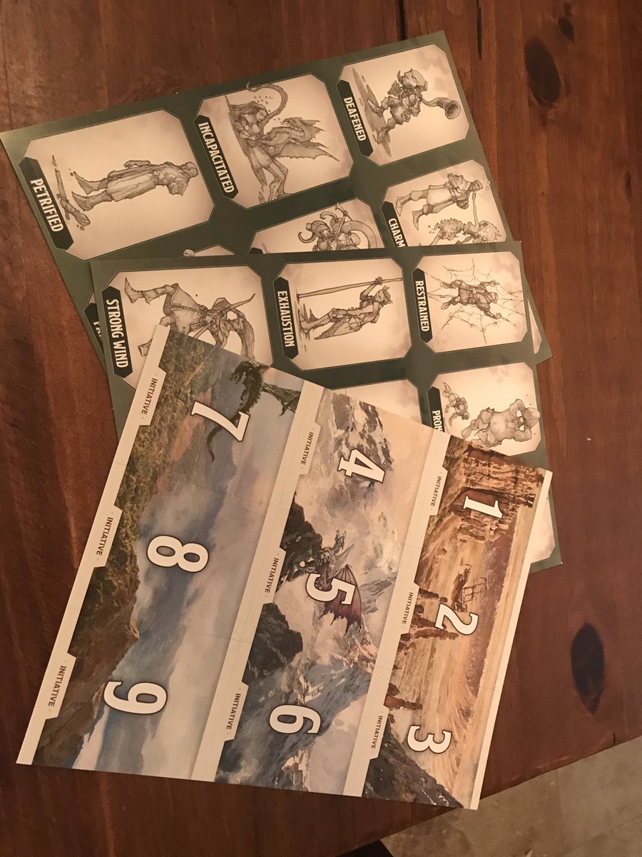 3 of the included pages are similar to the Essentials Kit—2 pages of condition card cut outs and 1 page of initiative cards.