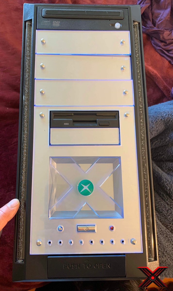 XboxDarkRoom's tweet photo. In celebration of the 19th anniversary of @Xbox, here’s a never before seen prototype dev kit shared with me by the late Brett Schnepf. The side bar lights glow green! 💚 https://t.co/gqN7Cplt2I