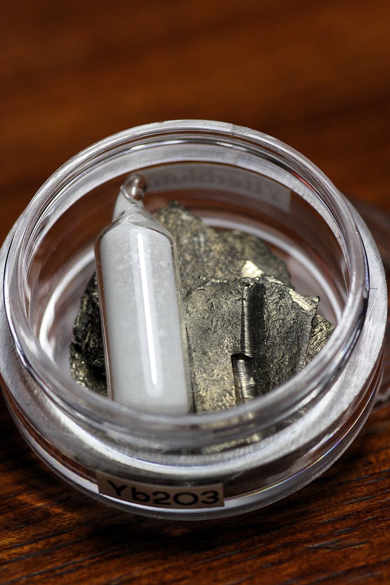 Ytterbium  #elementphotos. Elemental ytterbium is surprisingly soft (similar to zinc), has a lovely golden sheen, and I detected a faint 'burning' smell (likely due to slow oxidation) when cutting some into pieces. White compound is ytterbium oxide (Yb2O3).