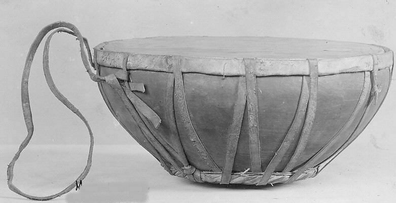 Tāśā (drum)made of Pottery, hide, woodoften we used to heard word Nagada, similar is this drum smaller but base is of burnt clay, what u can call terracotta?in RaasLeela, Swang, Nautanki etc & even in Temple tooMusical Instrument of India at  @metmuseum what you call it?