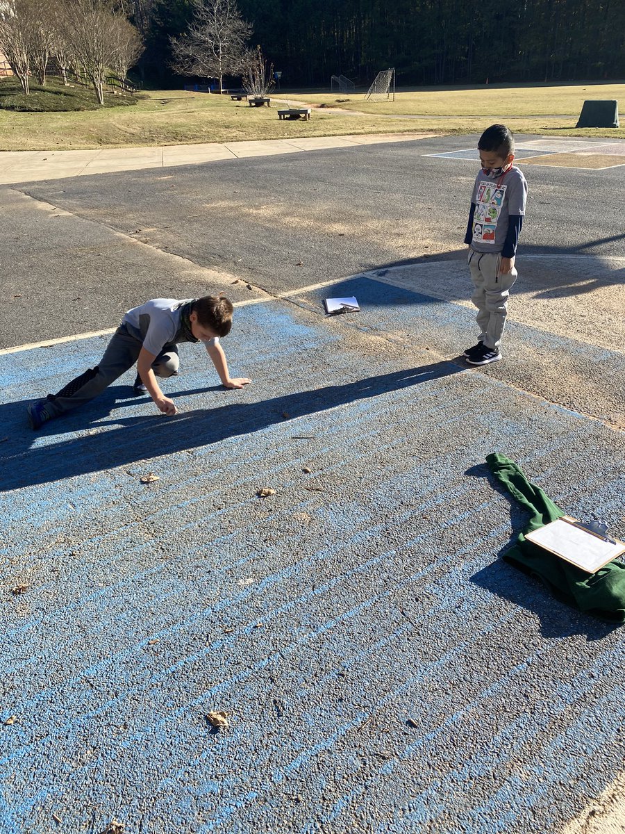 Exploring our shadows in the morning...we predict our shadows will be smaller in the afternoon. We will be back later to find out! @dolvines #DolvinGoesDigital