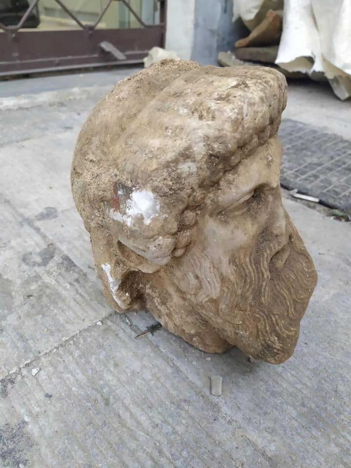 We're reminded once again that #Athens stands on the shoulders of giants. Or in this case, a 2400-year-old head of Hermes found this weekend during infrastructure work below Agias Irinis Square. It likely topped a column at a road crossing before becoming part of a drain channel.