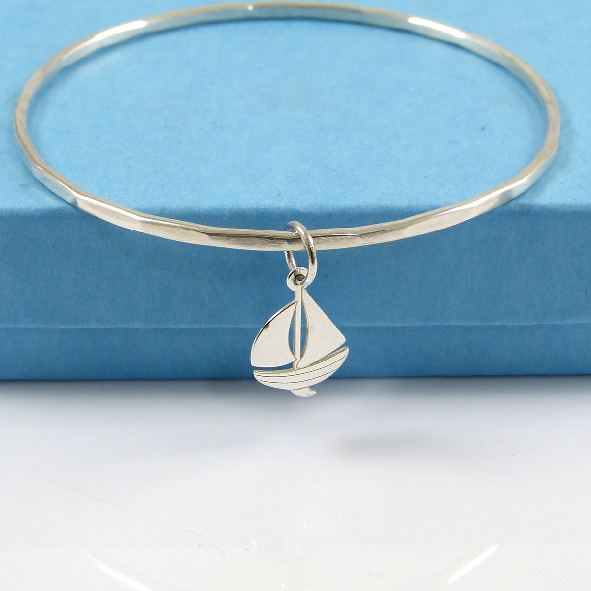 TheStrandline's tweet photo. Sterling Silver Boat Bangle, Boat Charm, Bangle Bracelet, SS Bangle, Sterling Silver Bangle,  Hammered Bangle, Boat Bangle, Nautical https://t.co/iUqZHmsMgQ #ChristmasGift #womaninbiz #UKGiftAM #Christmas2020 #supportsmallbusiness #SolidSilverBangle https://t.co/4LIBSYbjxq