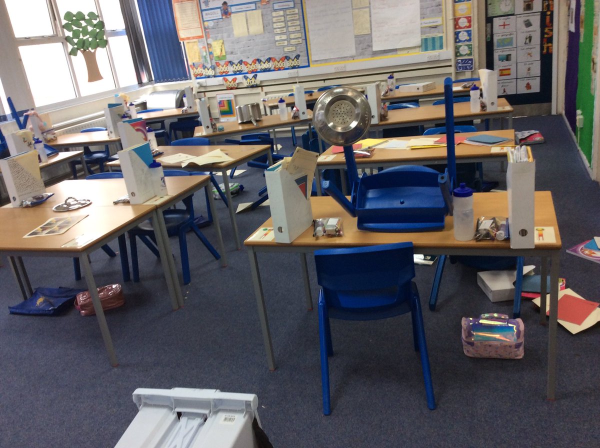 GSPSCostaRica's tweet photo. Look at our classroom!! This is what we walked into after break time and we had to complete our work in the hall trying to use evidence to work out what happened!! Who would do this to our classroom? Is there any clues you can see? #GSPSENGLISH #NEWTEXT @GwladysStPrim https://t.co/Hu7fYVbvVX