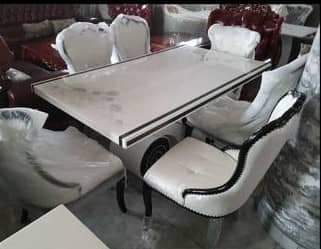 Classic marble dining table with six chairs 
Available for purchase 
Free delivery nationwide 090966798889