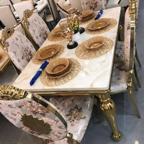 Classic portable royal puregold marble dining table with six chairs 
Available for purchase 
Place your order,
Free delivery nationwide
