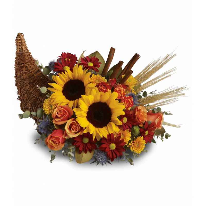 HallsFlowerShop's tweet photo. Our Fall Cornucopia is the perfect way to set a beautiful table!
#Sunflowers, orange #roses &amp; spray roses, red daisy spray #mums, yellow cushion spray mums, eucalyptus, cinnamon sticks &amp; wheat, perfectly arranged in a wicker #cornucopia.
#hallsflowershop #thanksgivingflowers https://t.co/sx1wWpHNFQ