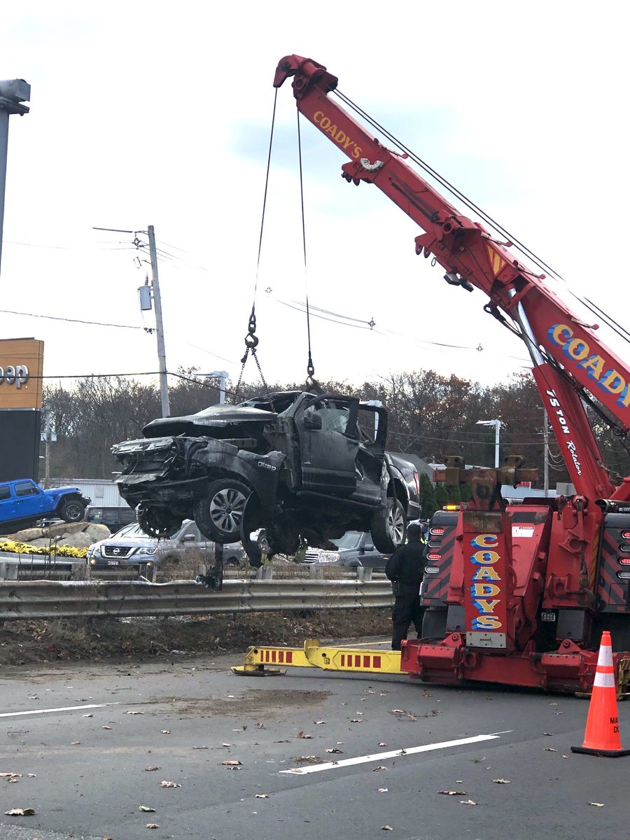 Crashed PU being lifted off of guard rails, Lynnfield. #wcvb #boston