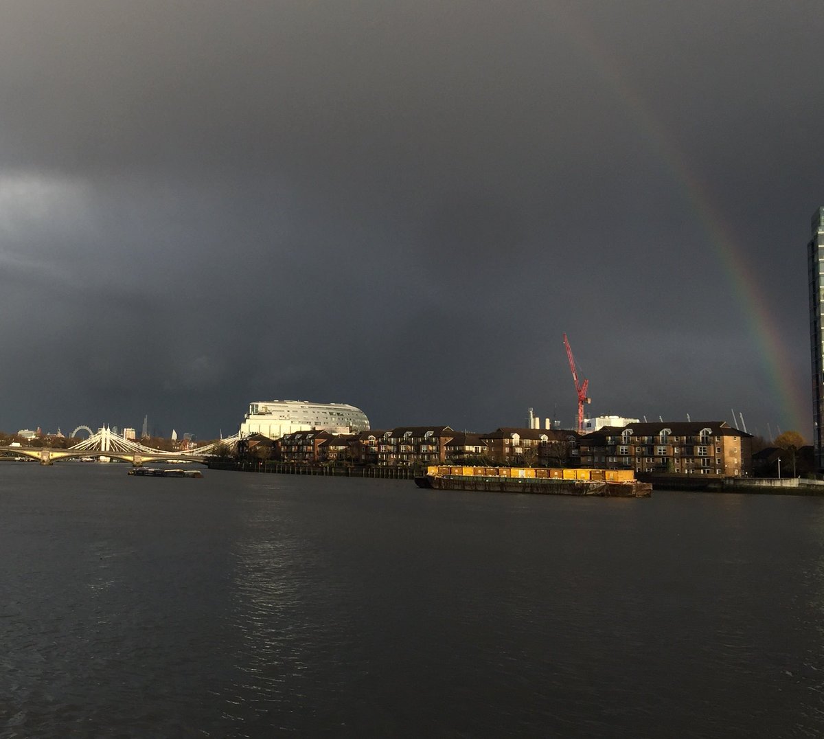 #Riverthames under the #rainbow and on the left, #Batterseabridge #Albertbridge and the #Londoneye on the background #Londonlockdown