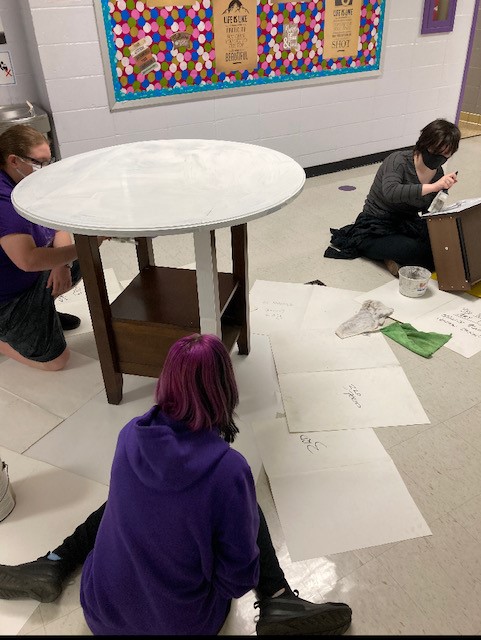 JAG teaming up with Mrs. Hall's art class to create some great tables for Caffeination Station.  A big shout out to: Emily White, Autumn Angus, Desi Delisi, Taylor Tettamble, Safiyah Benzabeh, Emma Brown, Jaden Braiser, Justin Todd, and Mrs. Hall for all their hard work!