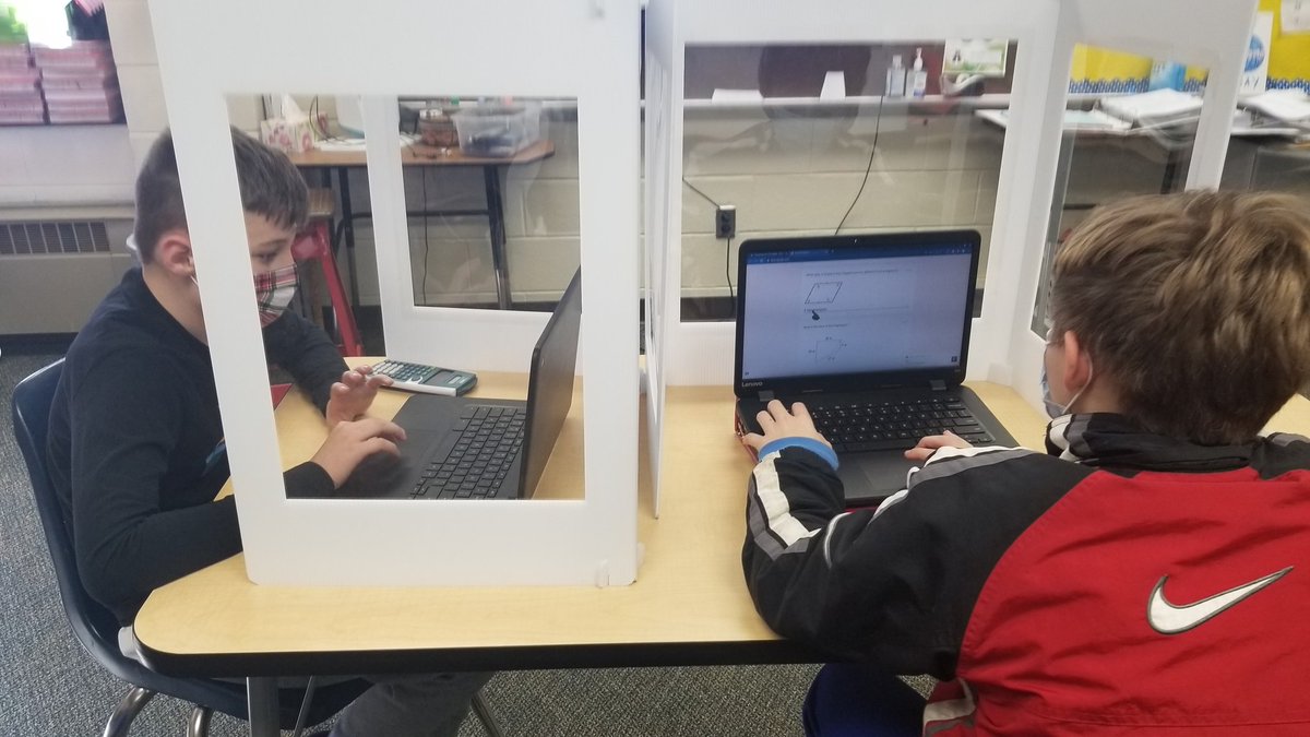 Teacher_Force's tweet photo. Despite the dividers and masks...kids are still collaborating and learning mathematics!! @HarmonPrincipal @StaciAlbanese https://t.co/UiASfbTHbw