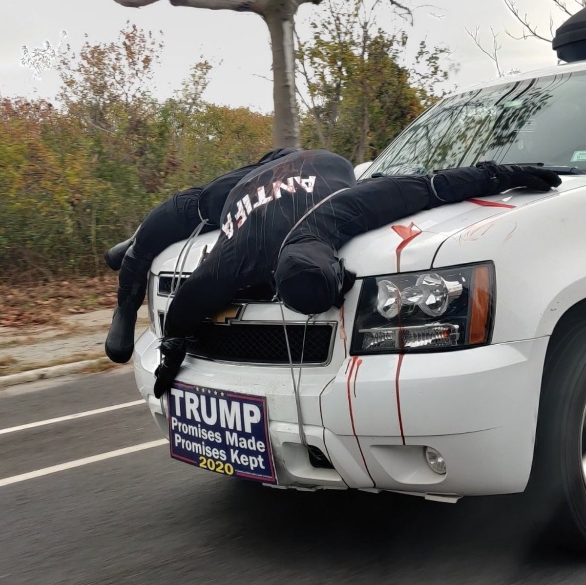 With your guns, and your bear mace, and your blind cultish devotion to the President, and your Trump-flag-waving traffic-blocking attacks on campaign buses...and shit like THIS...