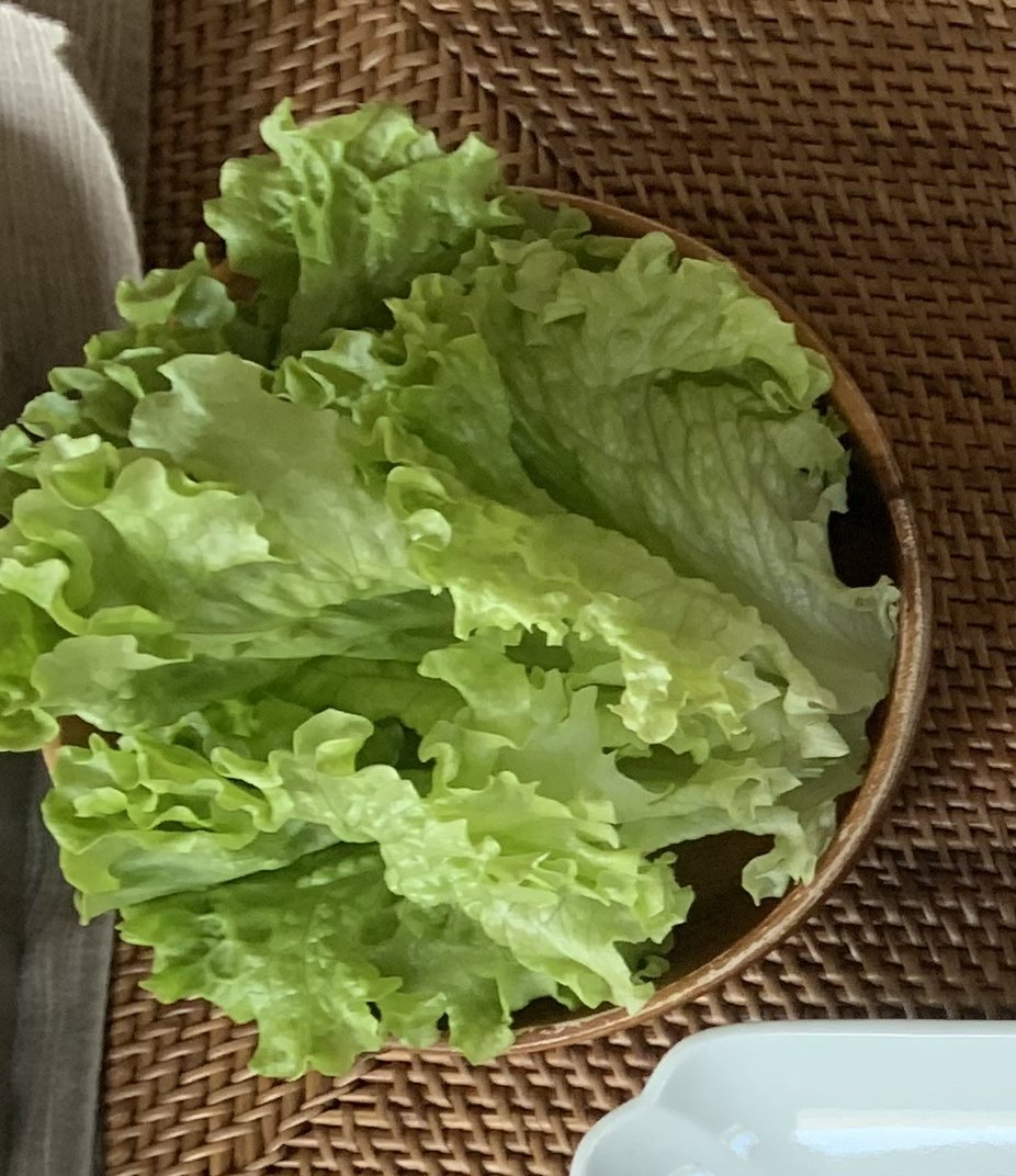 We love lettuce with meat. Like burrito, but with lettuce, you wrap a spoon of rice, a piece of meat, Ssamjang(the most common sauce in k-bbq), and whatever you'd like.We wrap them, and normally we don't bite it, but put it in mouth at one go.