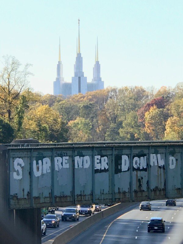 JYash's tweet image. Longtime DMV peeps remember the iconic “Surrender Dorothy” graffiti on the bridge over 495 near the Mormon Temple. Today, a new twist on the old sign. @mymcmedia