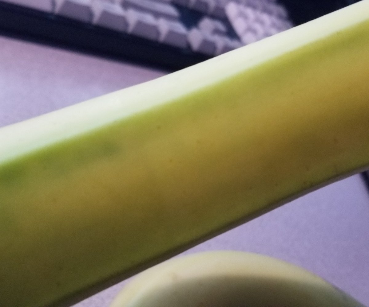 And after 15 minutes on the UV-C light, the other banana looks like this... pretty much the same.You can spot a little bit of faint difference in color if you look very closely, but it's barely there.But we need to wait.